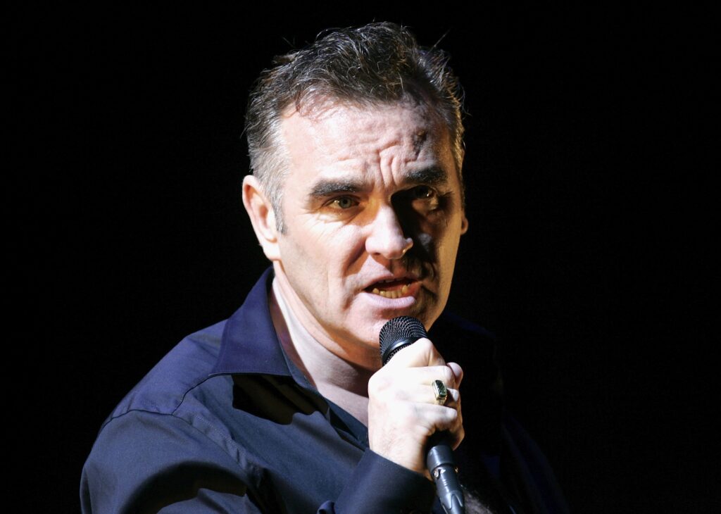 CHELMSFORD - AUGUST 20: Morrissey performs at the V Festival In Hylands Park on August 20, 2006 in Chelmsford, England. (Photo by Jo Hale/Getty Images)